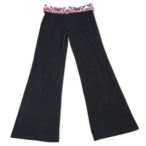 black and pink flare pants with foldover waistband